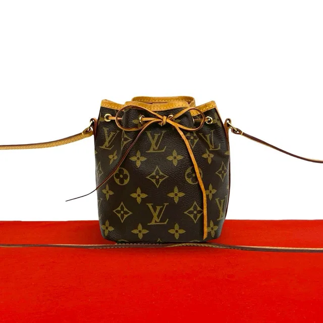 Louis Vuitton Nano Noe Monogram Logo Pattern Leather Mini Shoulder Bag Pochette in Leather from The Reluxe