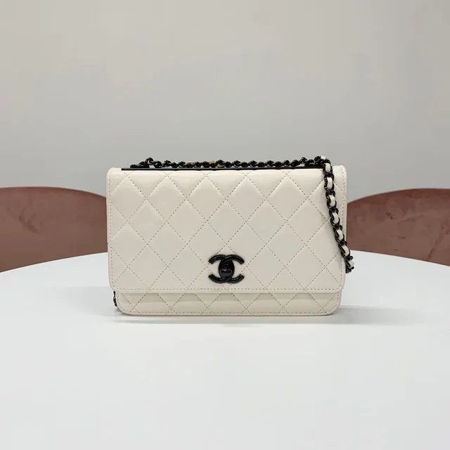 Chanel Turnlock Shoulder Bag Chain Wallet in Lambskin from The Reluxe