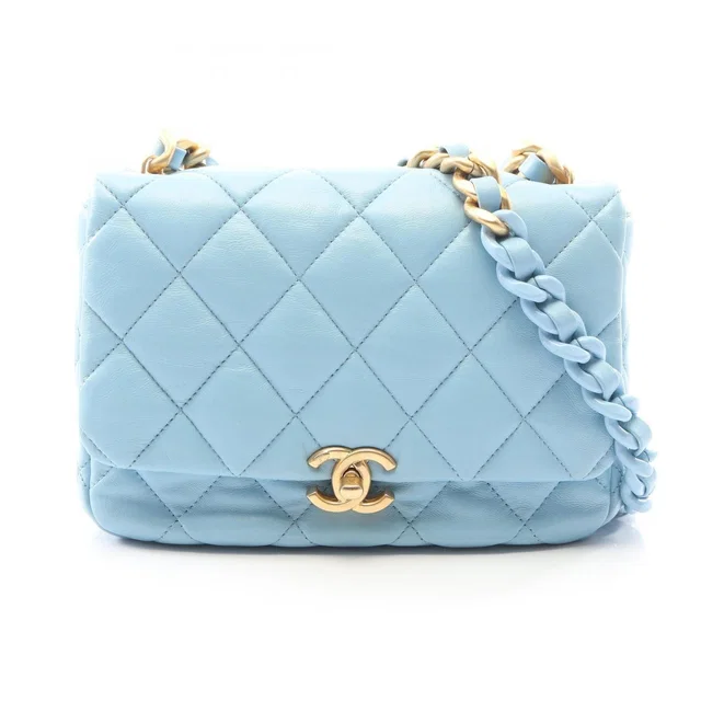 Chanel Shoulder Bag Quilted Light Blue Lambskin Small Flap Chain in Blue Lambskin from The Reluxe