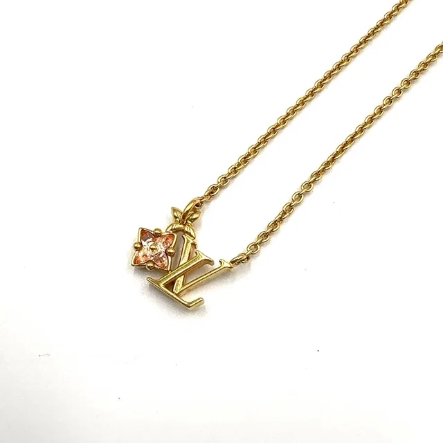 Louis Vuitton Corrie Loulou Glam Color Stone Gold Pink Necklace in Pink from The Reluxe