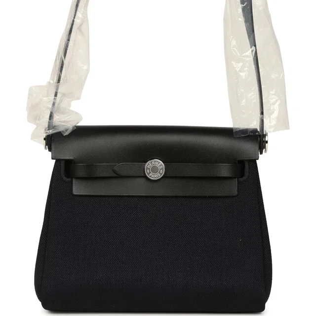 Hermès Herbag Zip 20 Mini Black Toile Militaire Canvas and Vache Hunter Palladium Hardware in Black Canvas from Madison Avenue Couture