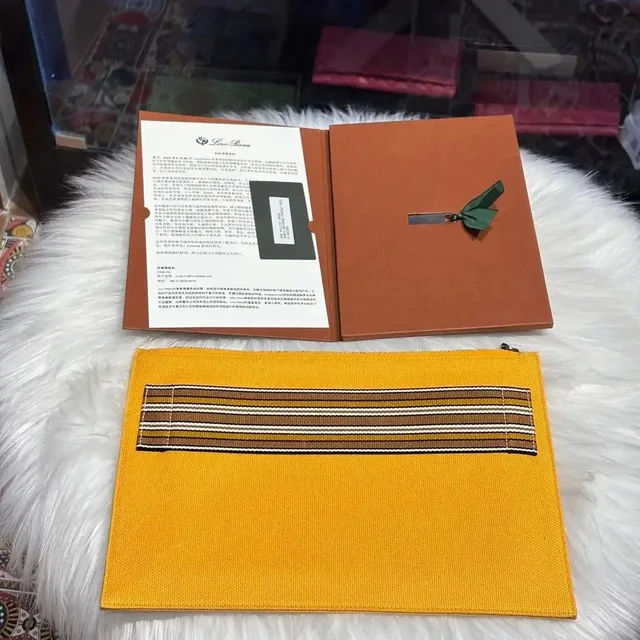 Loro Piana Applique Clutch in yellow Canvas from Grailed