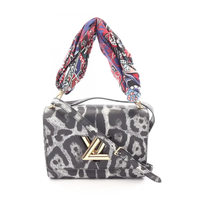 Louis Vuitton Handbag Twist MM Leopard Print in Coated canvas from The Reluxe