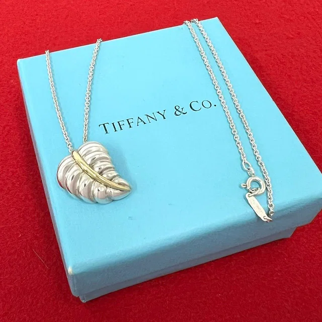 Tiffany & Co. Vintage Leaf Motif Necklace Silver Yellow Gold in Yellow from The Reluxe