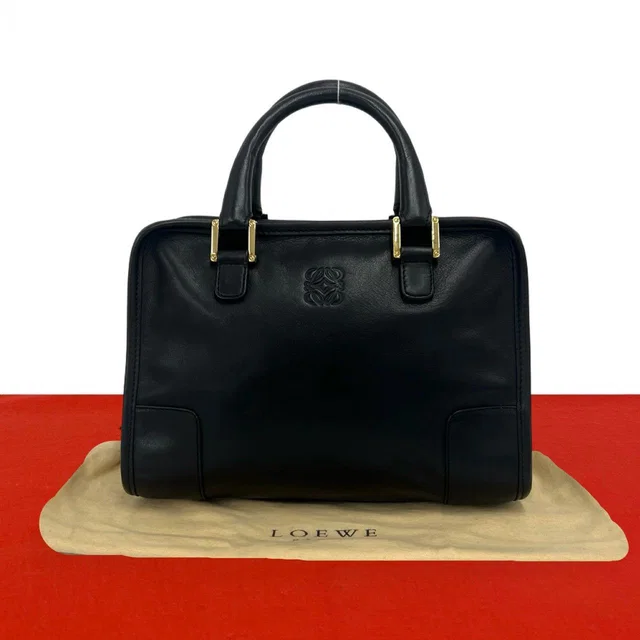 Loewe Amazona Anagram Logo Stamp Leather Mini Boston Bag Tote Black in Black Leather from The Reluxe