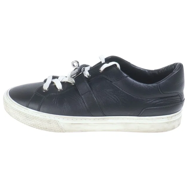 Hermès Day Kelly Buckle Low Cut Leather Sneakers Silver Black in Black Leather from The Reluxe