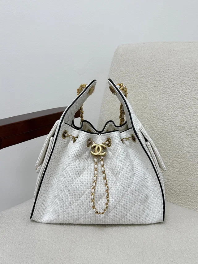 LONDON LOCATED* CHANEL 25 SMALL HANDBAG WHITE & BLACK Braided Raffia & Calfskin with Gold-Tone… in Black Calfskin from Luxury Promise