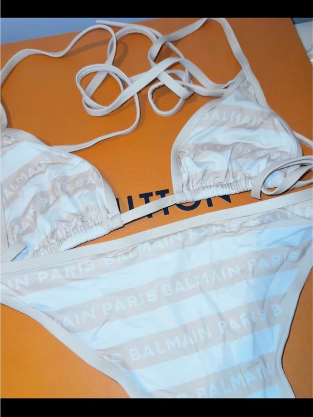 Balmain Paris White Logo Hang Tag in brown|white|neutral from Poshmark
