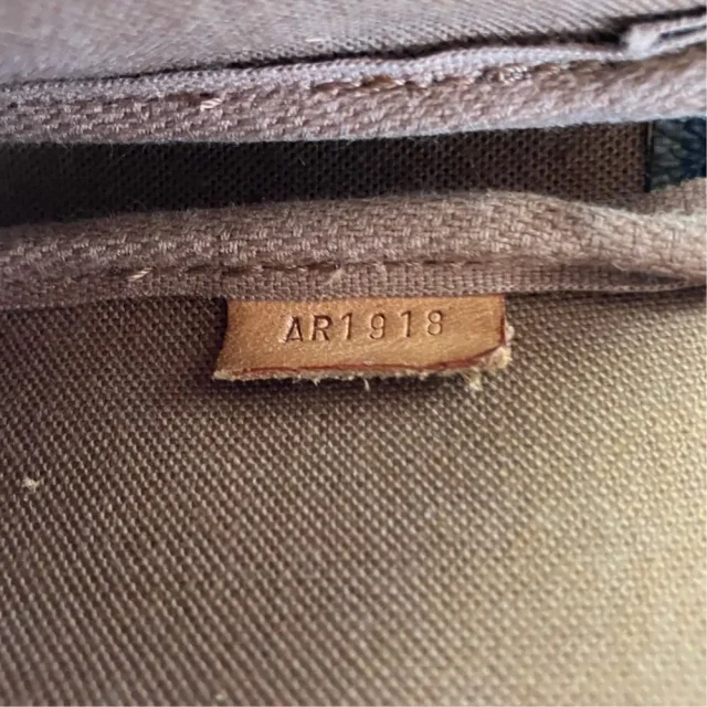Louis Vuitton Monogram Accessoire Pouch in Brown Canvas from LuxUness, photo 10 of 12