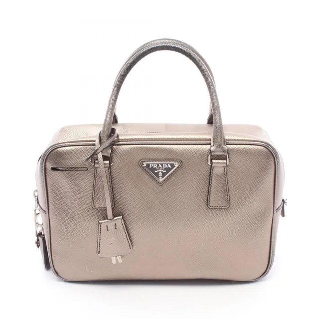 Prada Handbag Galleria Gold Leather Triangle Logo Hand Bag in Gold Leather from The Reluxe