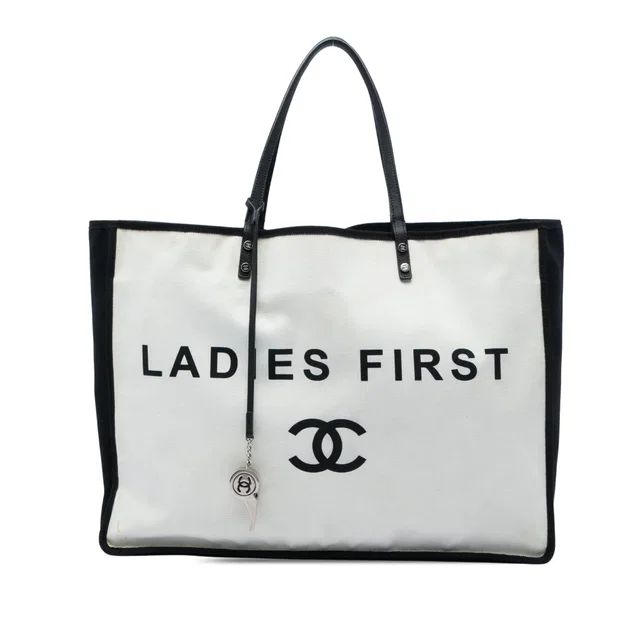 Black Chanel Bicolor Canvas Ladies First Shopping Tote Travel Bag in Black Canvas from Designer Revival