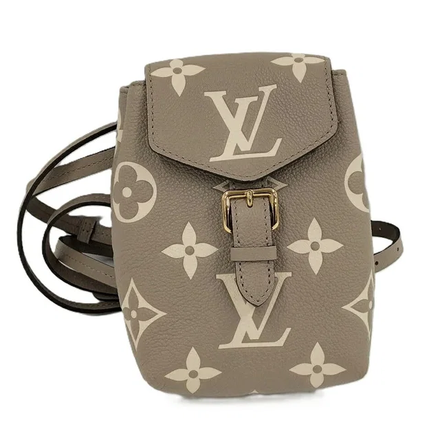 Louis Vuitton Tiny Backpack Monogram Empreinte Beige in Beige Leather from The Reluxe
