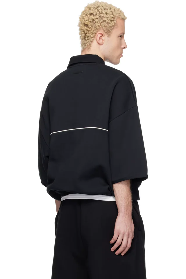 Fear of God ESSENTIALS Black Active Trace 3/4 Sleeve Modern Polo, photo 3 of 4 from SSENSE