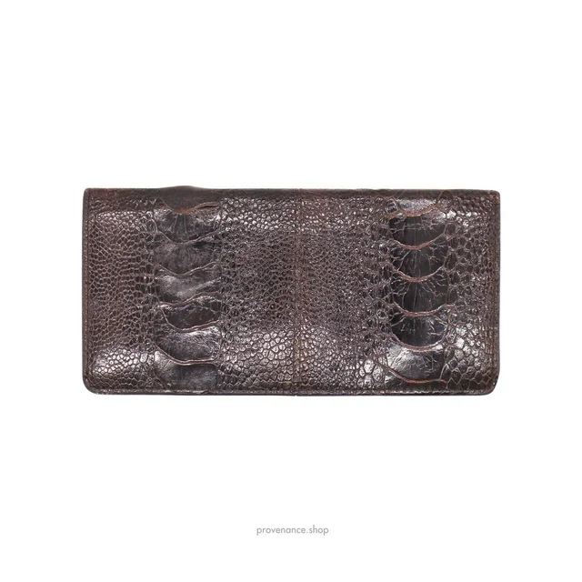 Givenchy Women's Wallet - Brown in red|brown from Depop, photo 1 of 1