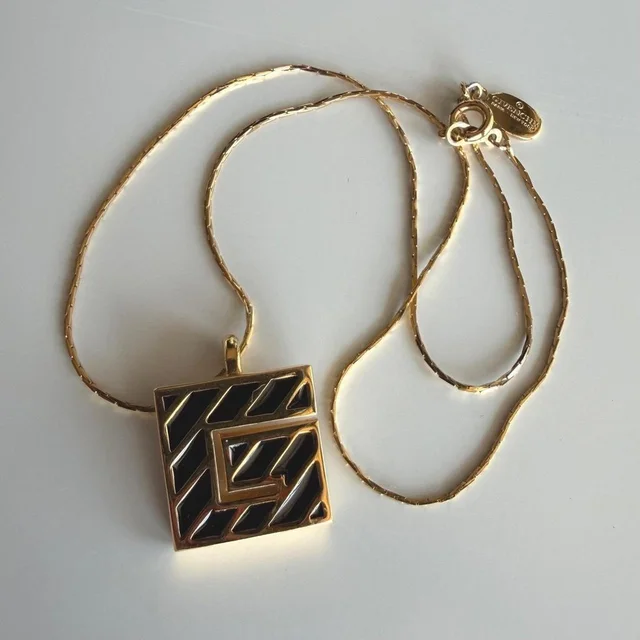 Givenchy Women's Necklace - Gold/Black in gold|black from Depop, photo 1 of 1
