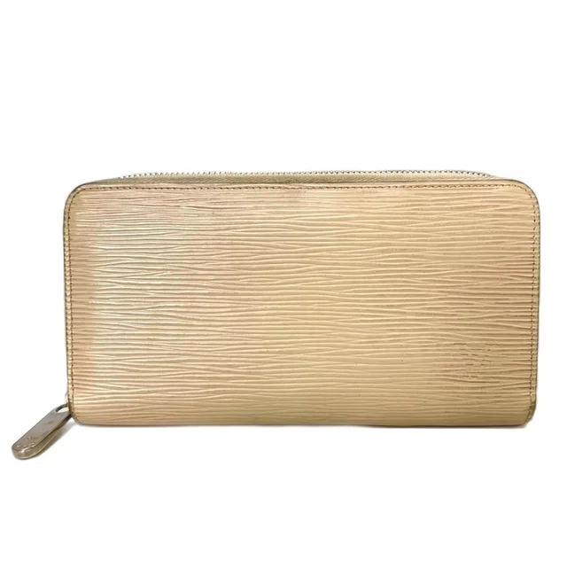 Louis Vuitton Zippy Wallet Epi Dune Beige in Beige from The Reluxe