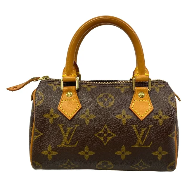 Louis Vuitton Handbag Monogram Mini Speedy in Coated canvas from The Reluxe