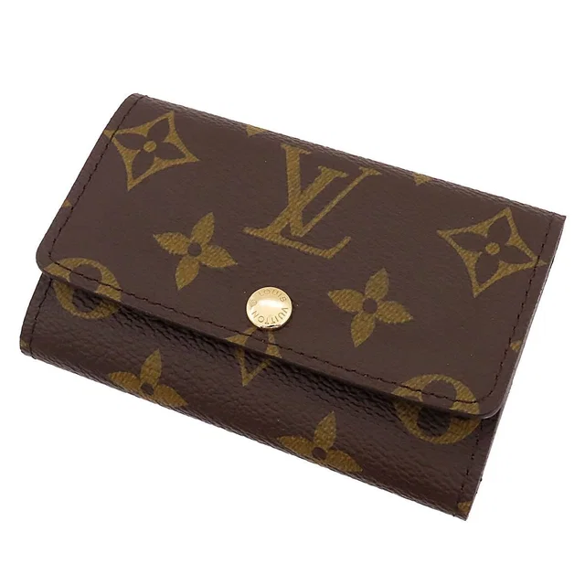 Louis Vuitton Multicles 6 Brown Gold Monogram Canvas Key Case Key Holder in Brown Coated canvas from The Reluxe