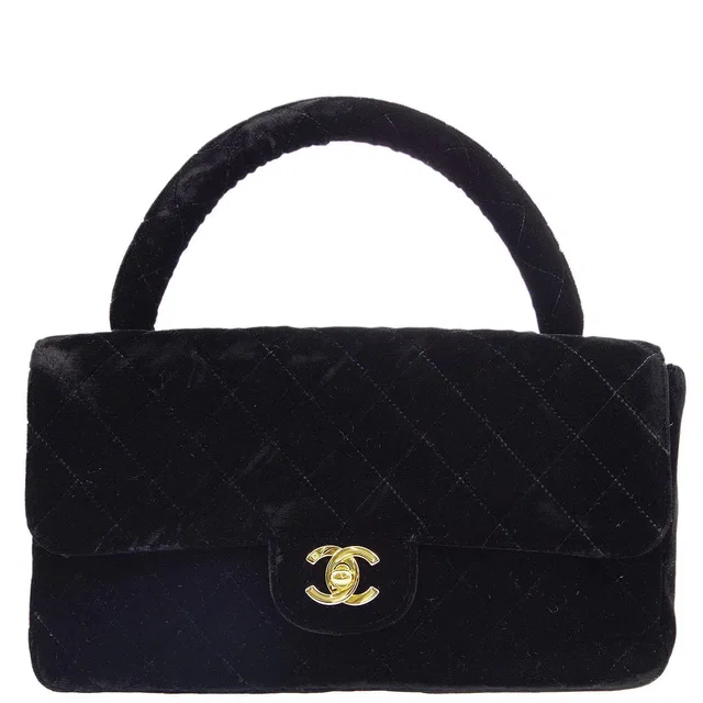 Chanel 1991-1994 Black Velvet Medium Classic Flap Handbag in Black Velvet from AMORE Vintage Tokyo