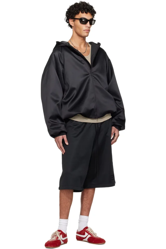 Fear of God ESSENTIALS Black Holiday Satin Fleece Relaxed Shorts, photo 4 of 4 from SSENSE