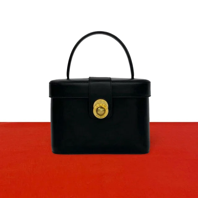 Celine Vintage Star Ball Logo Leather Handbag Vanity Bag Black in Black Leather from The Reluxe