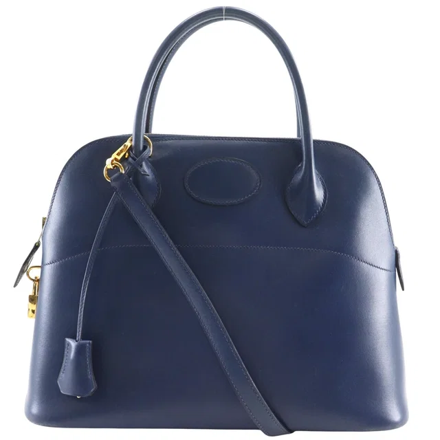 Hermès Bolide 31 2-Way Shoulder Votadelact Blue Marine Gold B Handbag in Navy from The Reluxe
