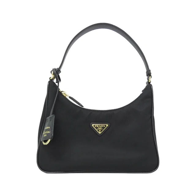 Prada Bag Handbag Gold in Gold Saffiano leather from The Reluxe