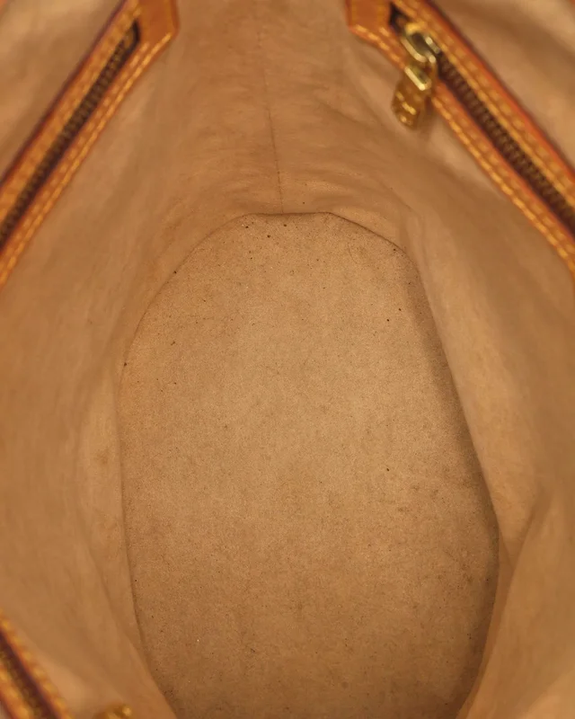 Louis Vuitton Nomad Bucket PM Bag in Leather from A Retro Tale, photo 11 of 13