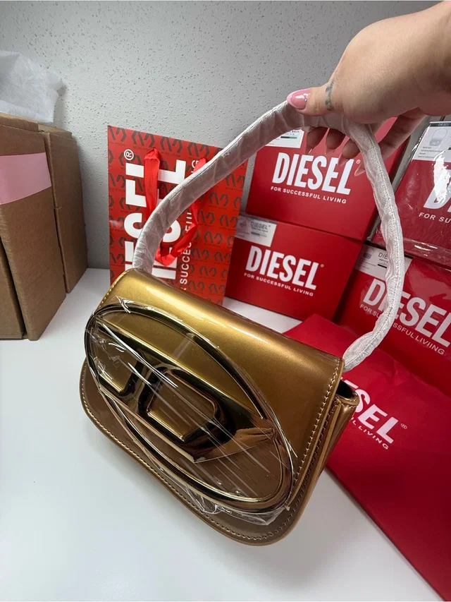 Diesel Metallic Gold Sculpted Logo Shoulder Bag in gold from Poshmark