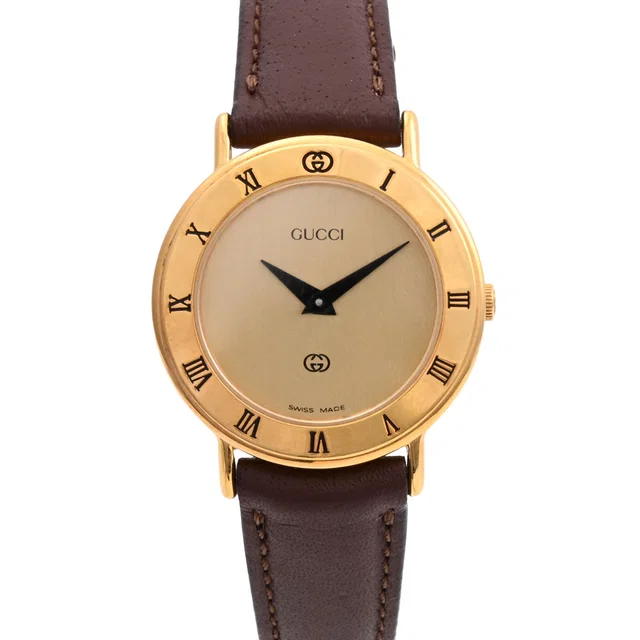 Gucci Round Logo Face Watch 3000L Quartz Champagne Gold in Gold Leather from VINTAGE QOO TOKYO