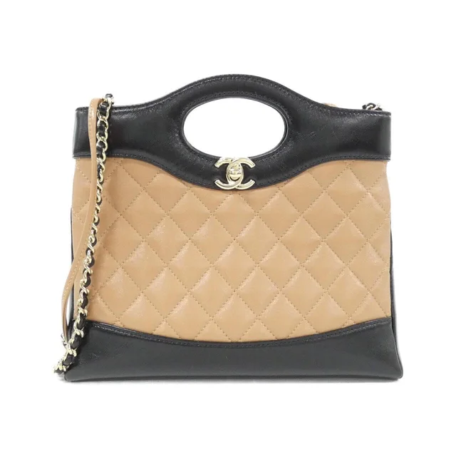 CHANEL 31 Line AS4133 Bag in BEIGE+BLACK / GOLD metal fittings lamb skin from KOMEHYO