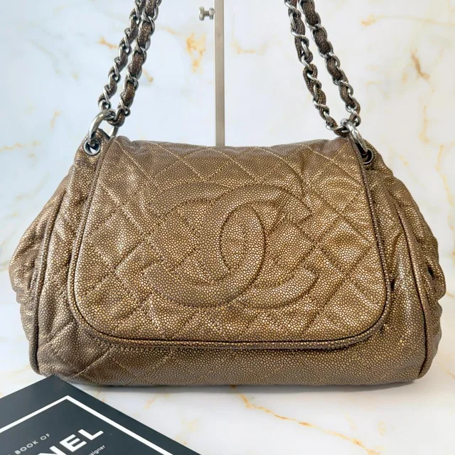 Chanel Quilted CC Logo Chain Shoulder Bag in Caviar leather from The Reluxe