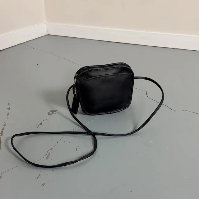 Coach Women's Crossbody bags - Black in black Leather from Depop, photo 1 of 1