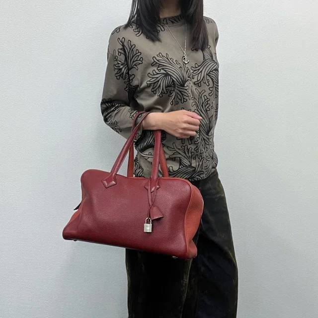 Hermès Victoria Bicolor Shoulder Bag Taurillon Clemence Bordeaux Brown Silver in Brown Clemence leather from The Reluxe