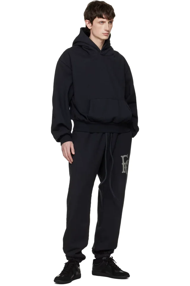 Fear of God Black Sunfaded Classic Half Raglan Pocket Hoodie, photo 4 of 4 from SSENSE