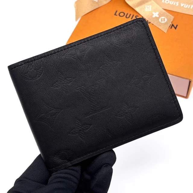 Louis Vuitton Monogram Shadow Portefeuille Multiple Bifold Wallet in Leather from The Reluxe