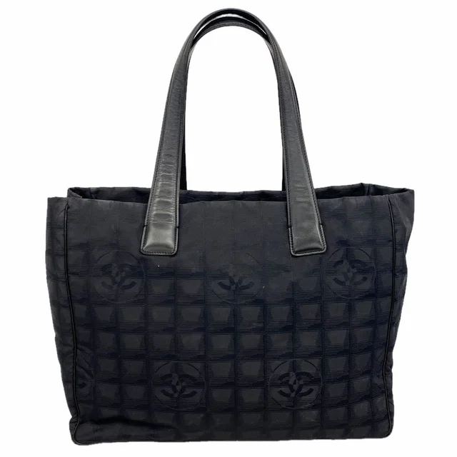 Chanel Tote Bag New Travel Nylon Black Gold in Black Nylon from The Reluxe