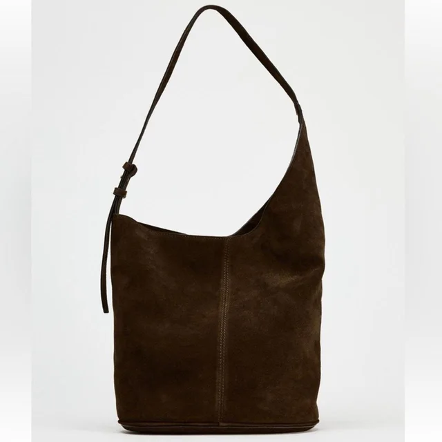 The Row Women's Tote bags - Brown in brown|red Suede from Depop, photo 1 of 1