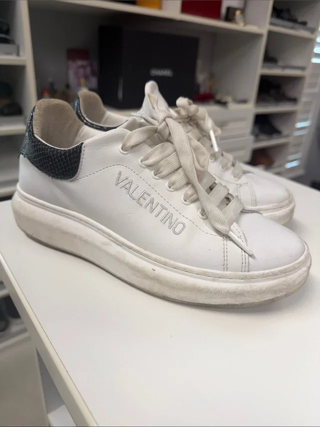 Valentino Garavani White Leather Low-Top Sneakers With Black Heel Detail in white|black Leather from Poshmark