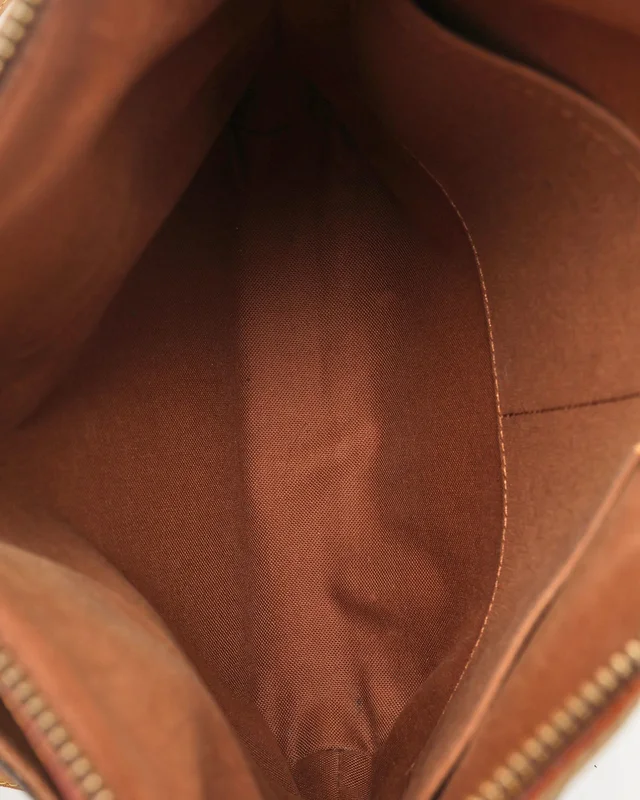 Louis Vuitton Monogram Odeon PM Bag in Coated canvas from A Retro Tale, photo 9 of 11