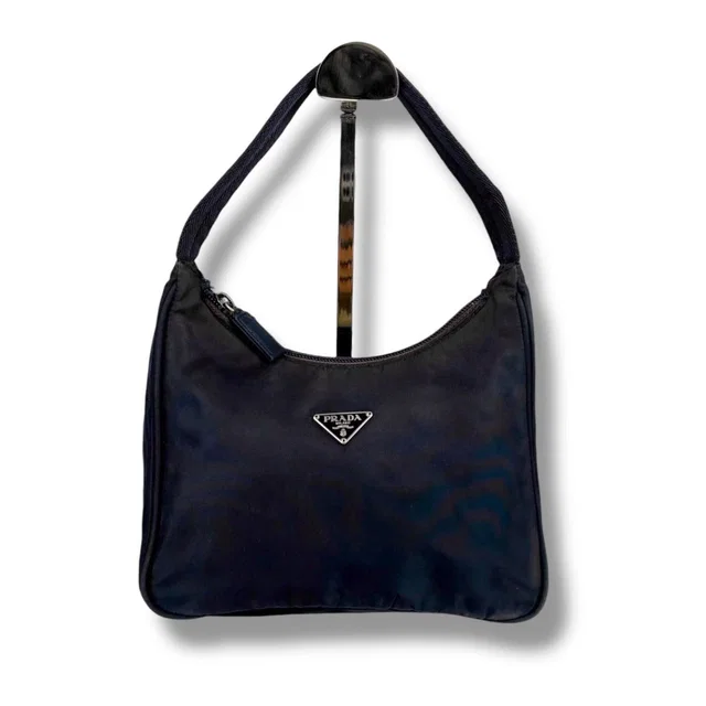 Prada Triangle Logo Pouch Mini Handbag Tessuto Nylon Navy Blue in Navy Nylon from The Reluxe