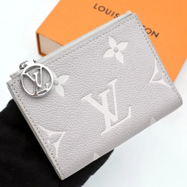Louis Vuitton Empreinte Bicolor Portefeuille Lisa Bifold Wallet in Leather from The Reluxe