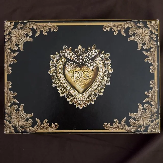 Dolce & Gabbana Phone case - Black/Gold in black|gold from Depop, photo 1 of 1