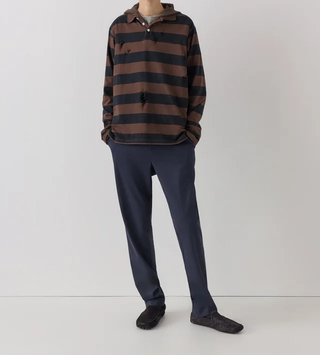 Gimaguas Striped polo shirt in Cotton 100% Description: The polo collar and button placket evoke a collegiate vibe, while scattered distressed details amidst the stripes reveal a…, photo 3 of 4 from SENSER
