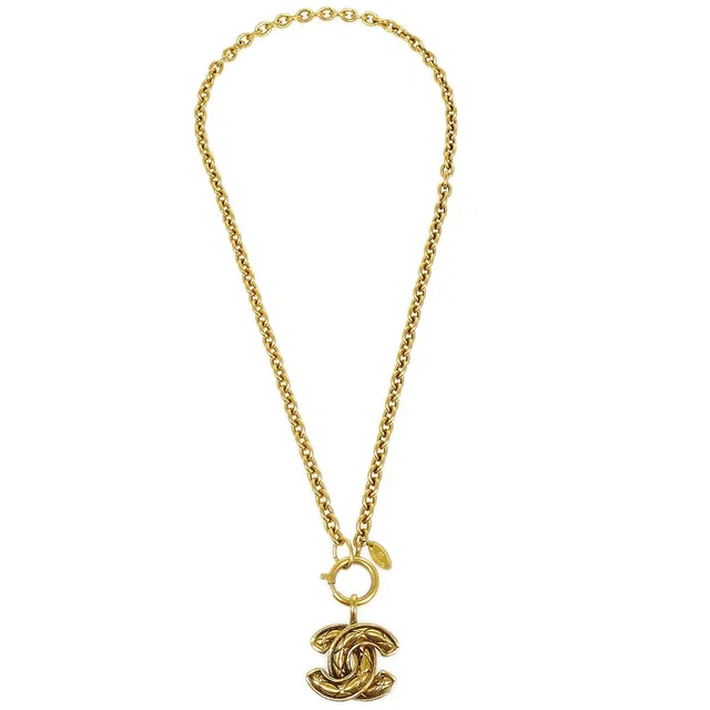Chanel Quilted CC Gold Chain Pendant Necklace 3857 in Gold from AMORE Vintage Tokyo
