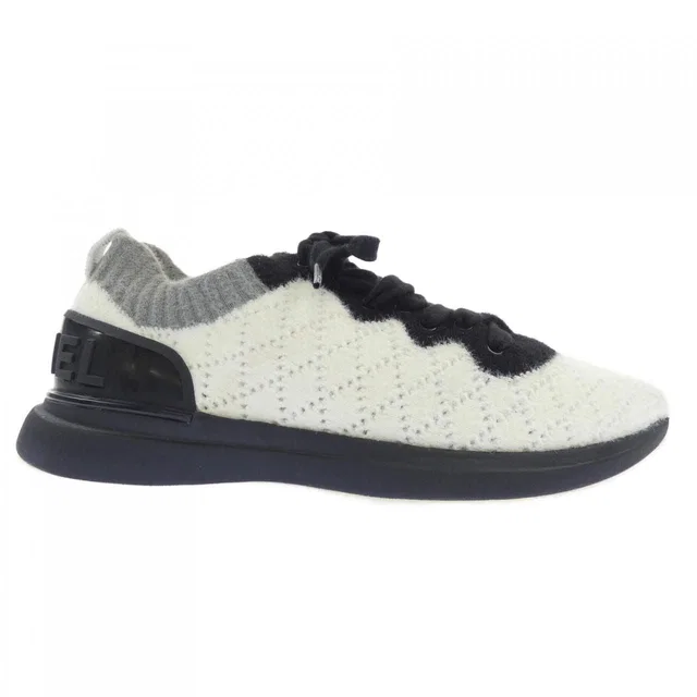 Chanel Sneakers White in White from The Reluxe