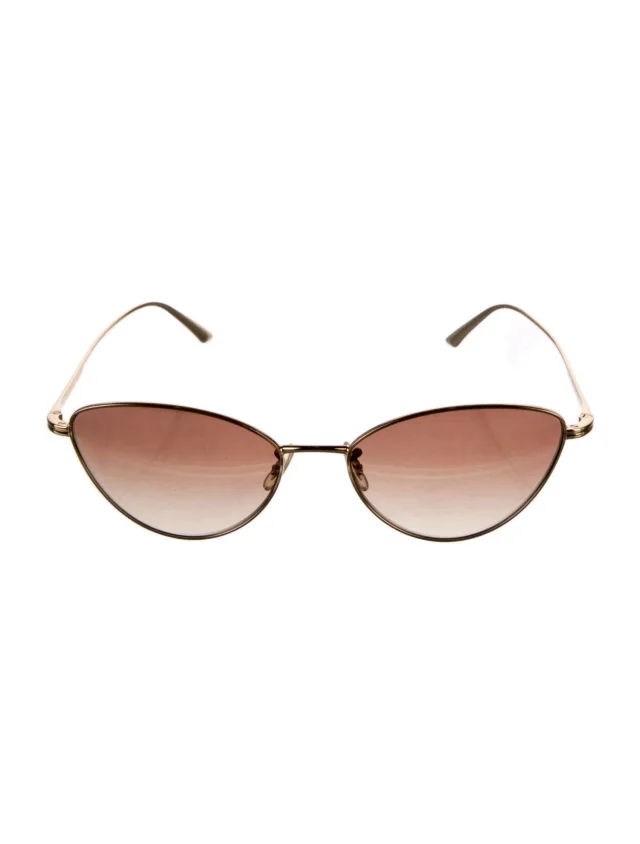 Khaite Round Tinted Sunglasses in gold from The RealReal
