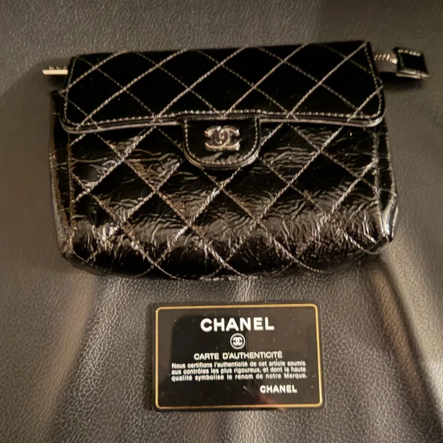 Chanel Patent Quilted Cosmetic Case W/Built In Mirror. Made In Italy in black Patent leather from Poshmark, photo 1 of 1