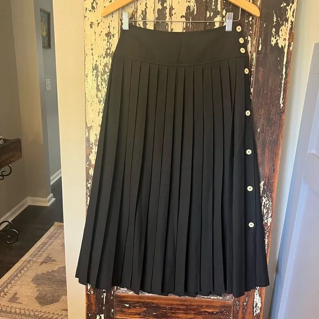 Chopard Vintage Elegant Black Pleated Skirt With Button Detail Size 8 in white|black from Poshmark