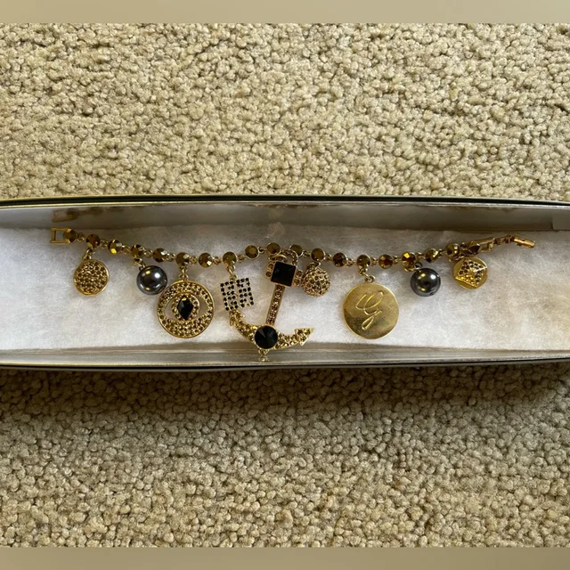 Givenchy Vintage Gold Charm Bracelet Rare Nautical Link Chain in black|gold from Poshmark, photo 1 of 1